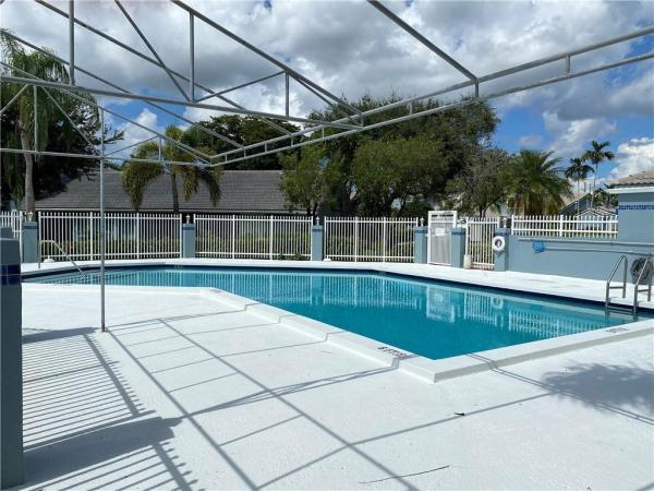 Waterford Town Villas At Woodmont, 8242 Waterford Ave, Tamarac, Florida 33321, image 1