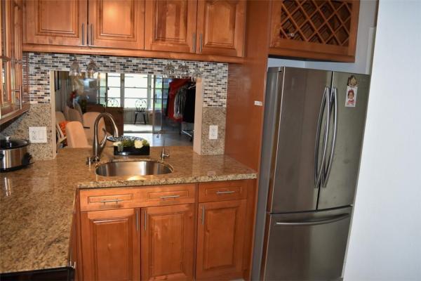 Poinciana Place Of Pine Island Ridge, 9430 Poinciana Pl #104, Davie, Florida 33324, image 1