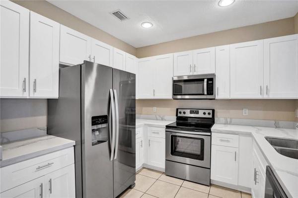 Carriage Homes At Bentley Park, 2934 NW 33rd Way, Lauderdale Lakes, Florida 33311, image 2