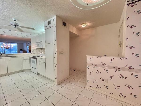 Devon, 7476 N Devon Dr #104, Tamarac, Florida 33321, image 1