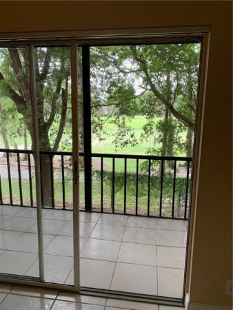 Versailles Gardens, 7911 N Colony Cir #210, Tamarac, Florida 33321, image 1