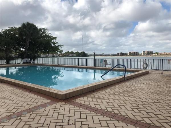 Summertree Village, 601 Ives Dairy Rd #104-8, Ives Estates, Florida 33179, image 2