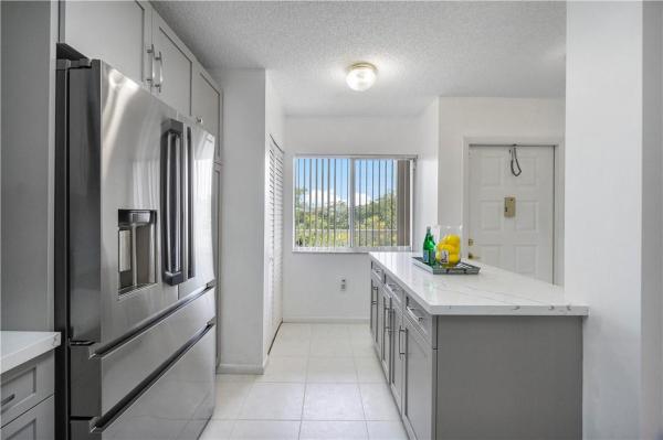 Weldon, 9537 Weldon Cir #I406, Tamarac, Florida 33321, image 1