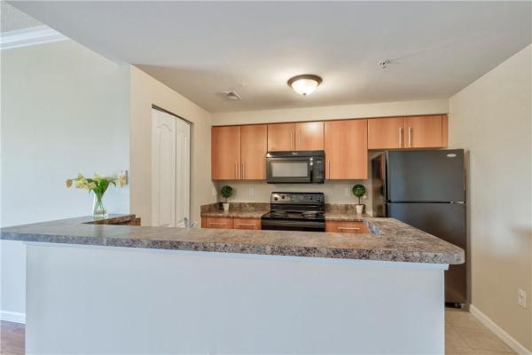 Poinciana Place, 5800 W Sample Rd #302, Coral Springs, Florida 33067, image 1