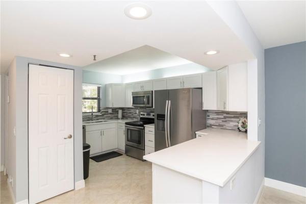 The Palms Of Deer Creek, 2400 Deer Creek Country Club Blvd #207-1, Deerfield Beach, Florida 33442, image 2