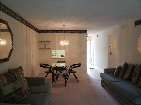 Cambridge House Of Carriage Hills, 301 Cambridge Rd #101, Hollywood, Florida 33024, image 1