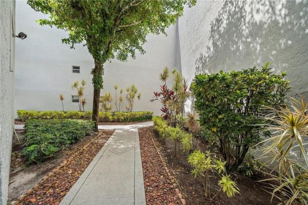 Carlisle At Poinciana Place, 6850 10th Ave N #104, Lake Worth, Florida 33467, image 1