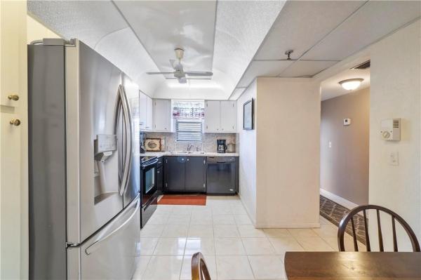 The Palms Of Deer Creek, 2400 Deer Creek Country Club Blvd #402-1, Deerfield Beach, Florida 33442, image 2