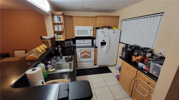Country Lane, 17000 NW 67th Ave #303, Country Club, Florida 33015, image 3