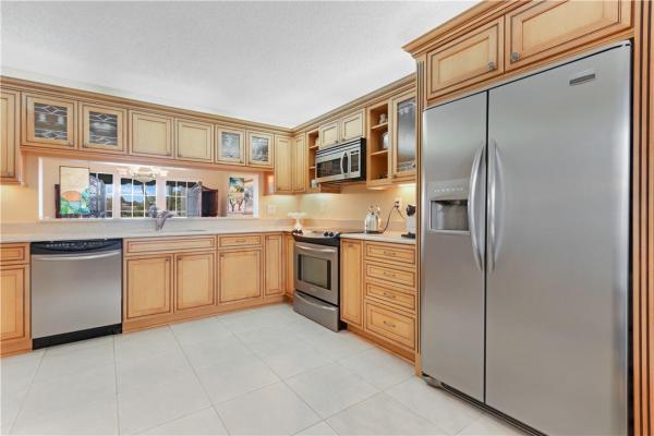 The Townhomes Of Deer Creek, 319 Deer Creek Lakeside Way, Deerfield Beach, Florida 33442, image 1