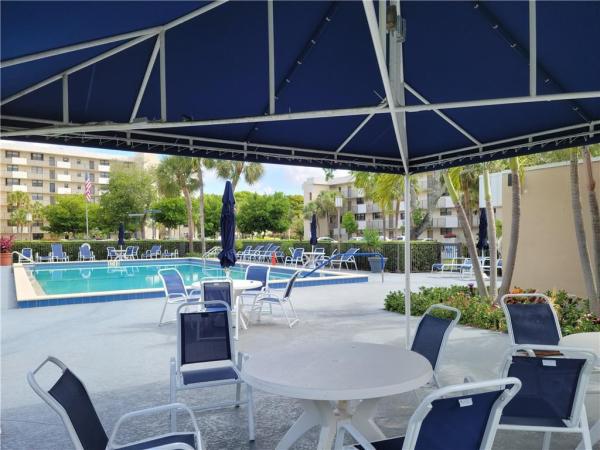 The Palms Of Deer Creek, 2420 Deer Creek Country Club Blvd #102-D, Deerfield Beach, Florida 33442, image 1