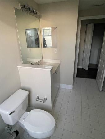 Poinciana Place, 5980 W Sample Rd #308, Lake Worth, Florida 33067, image 1