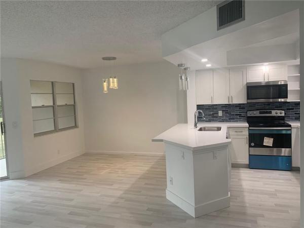 Cambridge At Century Village, 1000 SW 125th Ave #204N, Pembroke Pines, Florida 33027, image 1