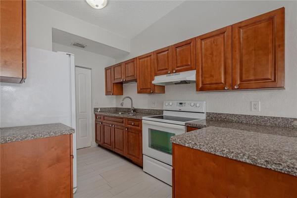 Rainbow Lakes Villas, 9267 NW 18th St, Pembroke Pines, Florida 33024, image 1