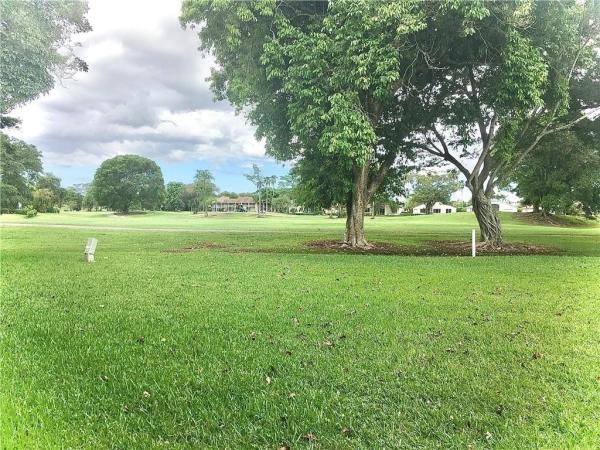 Holly Court At Woodmont, 8770 Holly Ct #104, Tamarac, Florida 33321, image 1