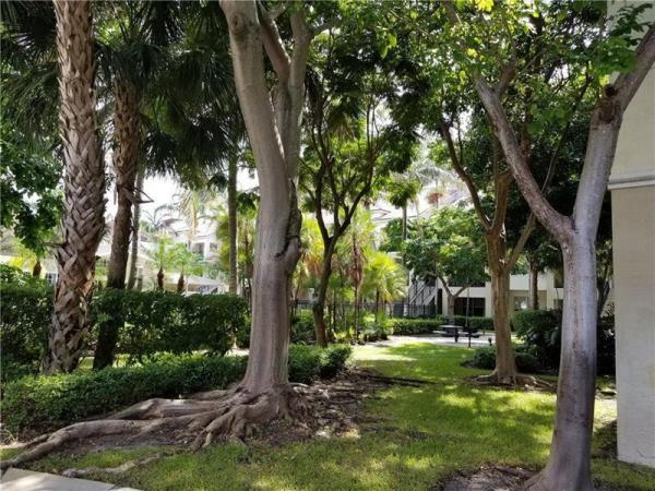 Poinciana Place, 5860 W Sample Rd #202, Lake Worth, Florida 33067, image 1