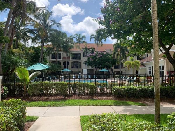 Poinciana Place, 5940 W Sample Rd #104, Lake Worth, Florida 33067, image 1