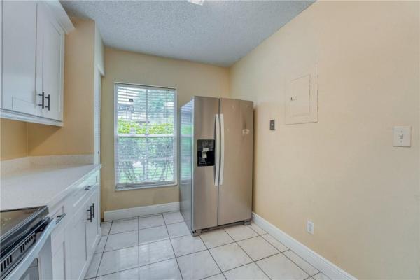 Villas At Woodland Greens, 5890 Woodland Point Dr, Tamarac, Florida 33319, image 1