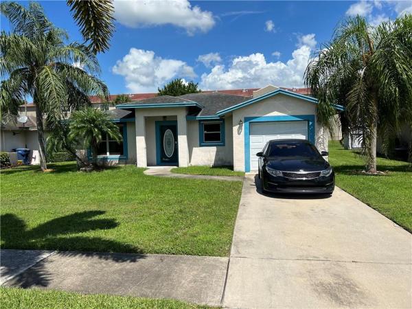 Hillsboro Estates, 149 Dabou Loop, Belle Glade, Florida 33430, image 1