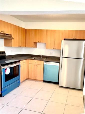 Townhouses Of Plantation, 4651 NW 9th Dr, Plantation, Florida 33317, image 1