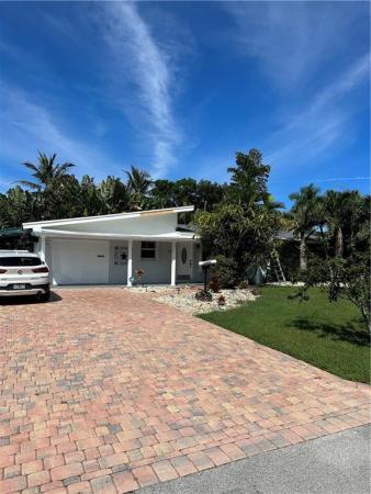 Curva Del Rio, 717 NW 805th Ne 21st Dr, Wilton Manors, Florida 33305, image 1