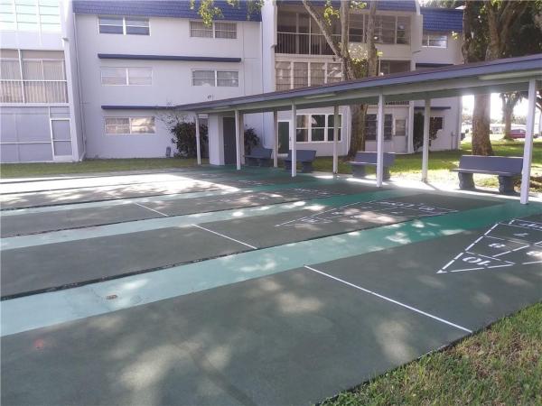 Oriole Golf & Tennis Club 1, 7847 Golf Circle Dr #111, Margate, Florida 33063, image 1
