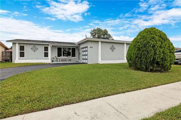 Sunrise Golf Village, 9331 NW 19th Pl, Sunrise, Florida 33322, image 1