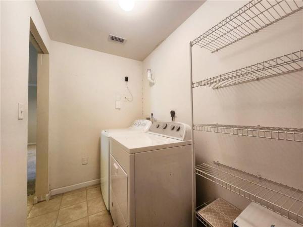 Poinciana Place, 5920 W Sample Rd #303, Lake Worth, Florida 33067, image 1
