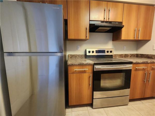 Poinciana Place, 5920 W Sample Rd #303, Lake Worth, Florida 33067, image 3
