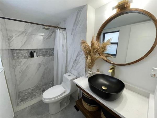 Middle River Homes, 2920 NE 8th Ter #106, Oakland Park, Florida 33334, image 2