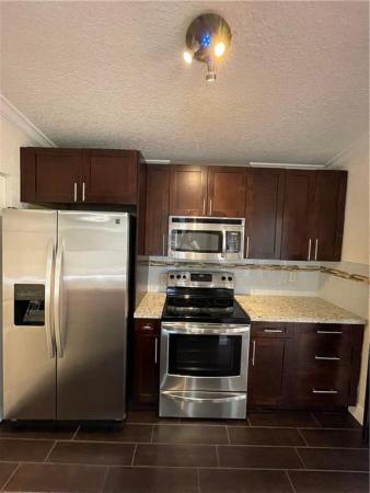 Pineapple Park At Woodmont, 8003 NW 71st Ct #8003, Tamarac, Florida 33321, image 1