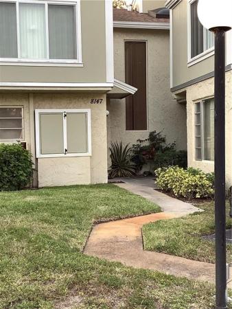 Sandpebbles Townhouse, 8147 Lagos De Campo Blvd #C-1, Tamarac, Florida 33321, image 1