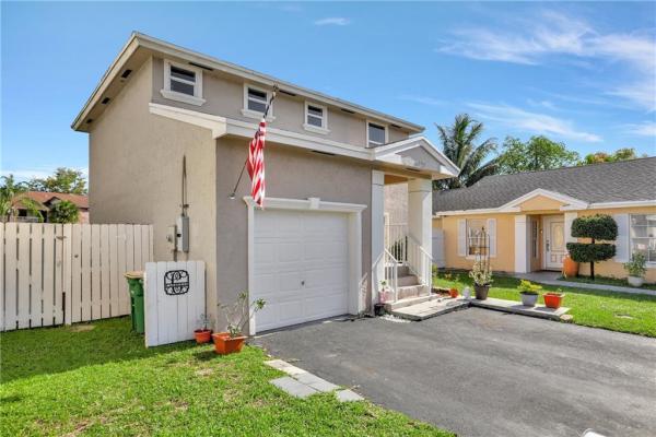 Villas At Woodland Greens, 6020 Woodland Point Dr, Tamarac, Florida 33319, image 1