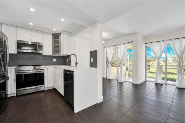 Sandpebbles Townhouse, 8045 Lagos De Campo Blvd #E-3, Tamarac, Florida 33321, image 1