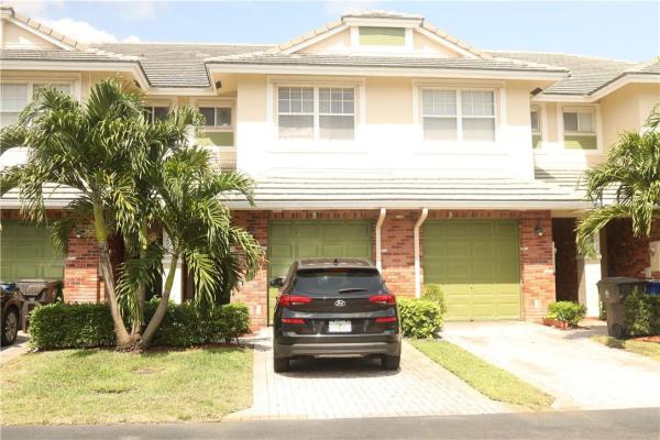Carriage Homes At Bentley Park, 2909 NW 33rd Ter, Lauderdale Lakes, Florida 33311, image 1