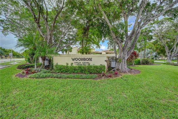 Holly Court At Woodmont, 8770 Holly Ct #102, Tamarac, Florida 33321, image 1