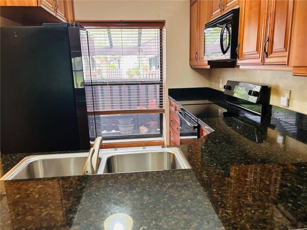 Tradewinds At Dos Lagos, 93 Via De Casas Norte #93X, Boynton Beach, Florida 33426, image 1