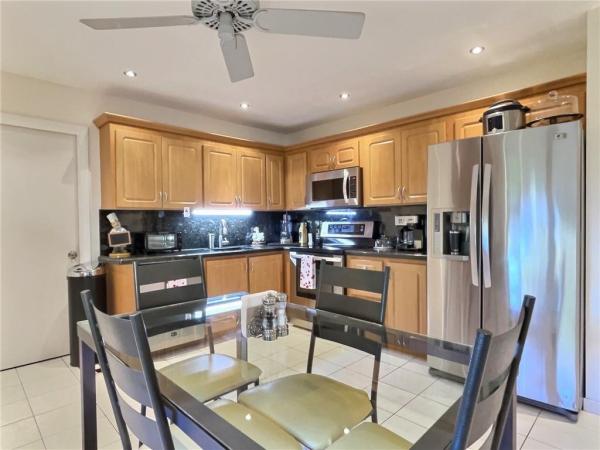 Azalea Court At Woodmont, 8730 Azalea Ct #201, Tamarac, Florida 33321, image 1