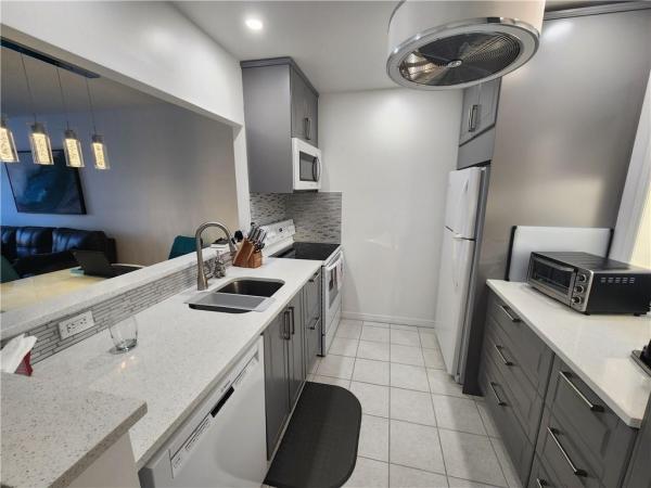 Marigold Gardens, 3506 NW 49th Ave #M-411, Lauderdale Lakes, Florida 33319, image 1