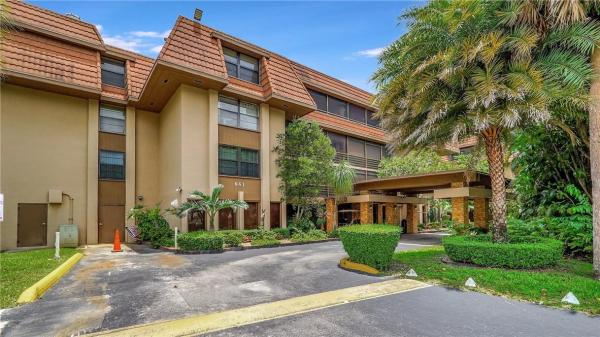 Coco Wood, 661 NE 195th St #110, Ives Estates, Florida 33179, image 1