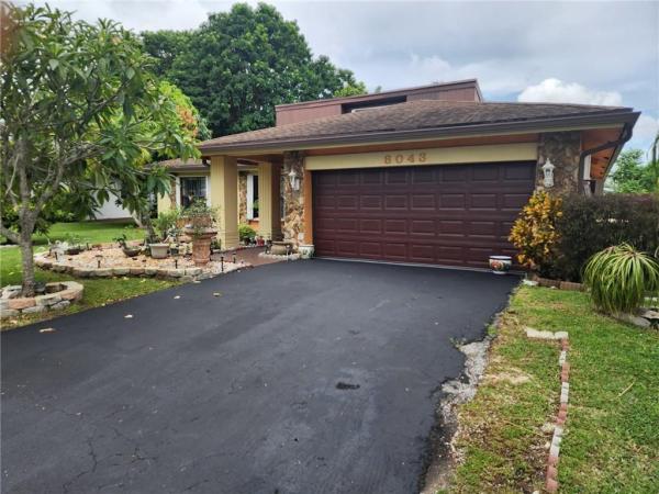 Buttonwood At Woodmont, 8043 Buttonwood Cir, Tamarac, Florida 33321, image 1