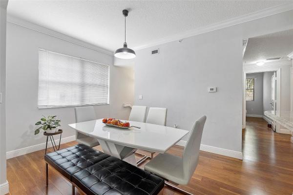 Poinciana Place, 5860 W Sample Rd #208, Lake Worth, Florida 33067, image 1