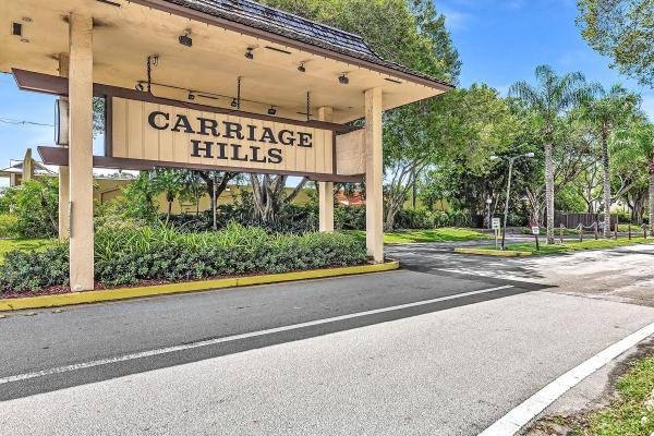 Villas At Carriage Hills, 108 Essex Rd #2-37, Hollywood, Florida 33024, image 1