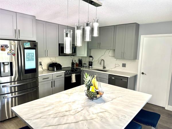 Azalea Court At Woodmont, 8750 Azalea Ct #105, Tamarac, Florida 33321, image 1