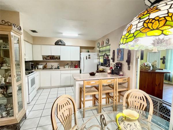 Heftler Homes, 10341 SW 50th Ter, Westwood Lakes, Florida 33165, image 1