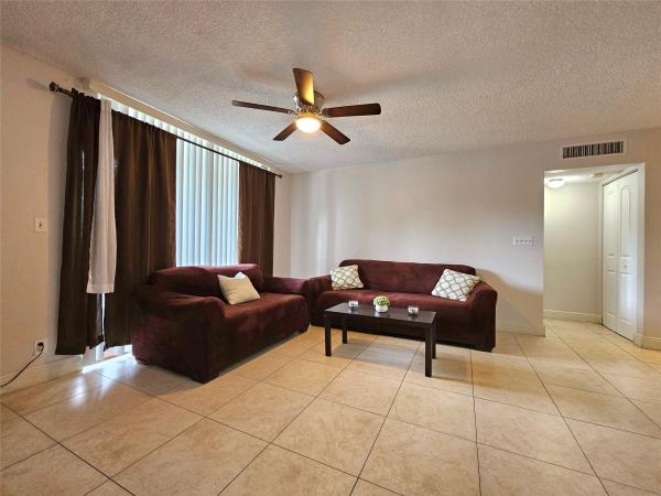 Coco Parc, 701 Lyons Rd #13-105, Coconut Creek, Florida 33063, image 1