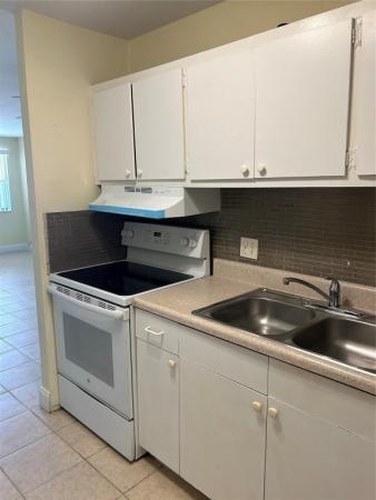 The Courtyards At Cimarron, 850 E Commercial Blvd #224C, Oakland Park, Florida 33334, image 1