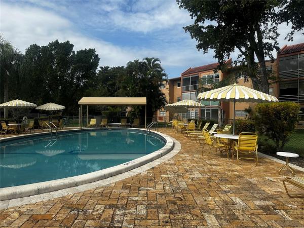 The Greens Of Tamarac, 8826 W Mcnab Rd #303, Tamarac, Florida 33321, image 1