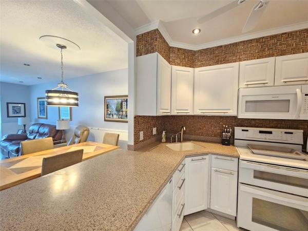 Petunia Gardens, 5171 W Oakland Park Blvd #202, Lauderdale Lakes, Florida 33313, image 1