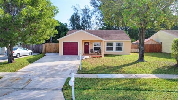Countrywood, 5086 Canal Cir, Lake Worth Beach, Florida 33467, image 1